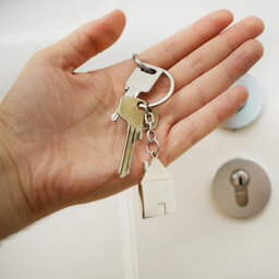 woman's hand holding keys